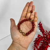 دستبند عقیق سرخ باپلاک بینهایت 0013